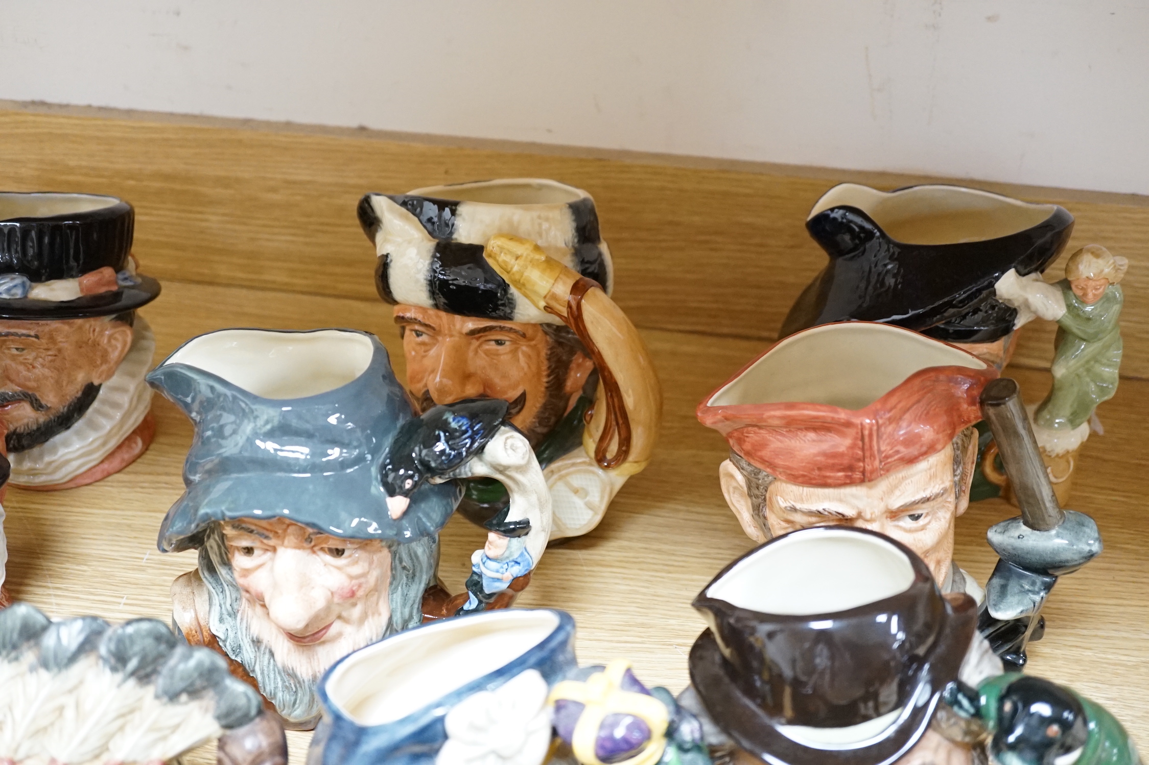 Fourteen Royal Doulton large character jugs